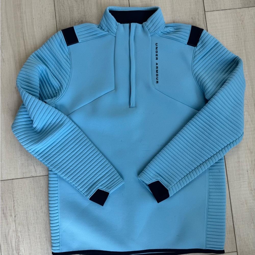 Women's medium Under Armour half zip pullover from their golf line!